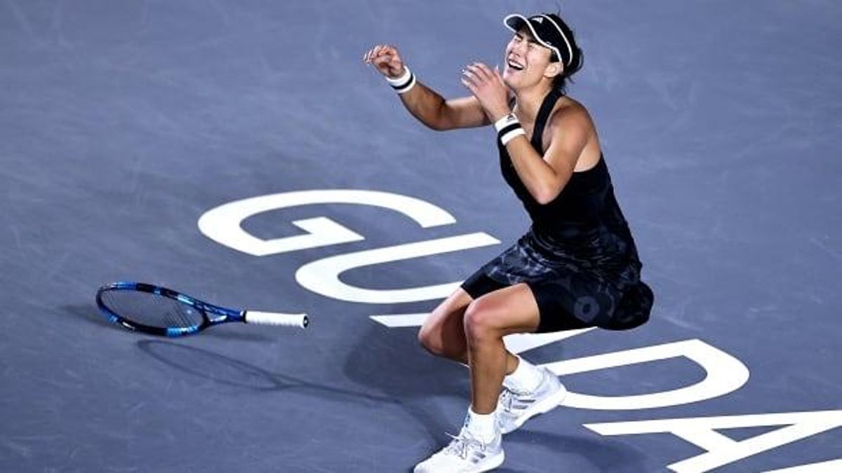 Muguruza celebra su título de maestra. Muguruza celebra su título de maestra.