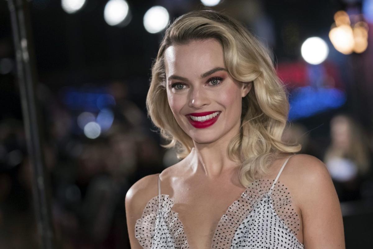 Margot Robbie poses for photographers upon her arrival at the premiere of the film  Mary Queen of Scots   in London  Robbie will bring the Barbie doll to life in a live-action film  Mattel and Warner Bros  Pictures  Photo by Vianney Le Caer Invision AP  File 