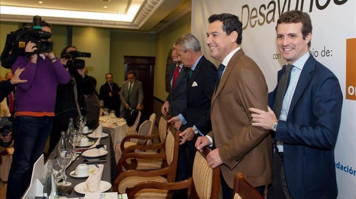 El presidente del PP, Pablo Casado, y el candidato conservador a la Junta de Andalucía, Juanma Moreno, el viernes, en un acto en Jaén. El presidente del PP, Pablo Casado, y el candidato conservador a la Junta de Andalucía, Juanma Moreno, el viernes, en un acto en Jaén.