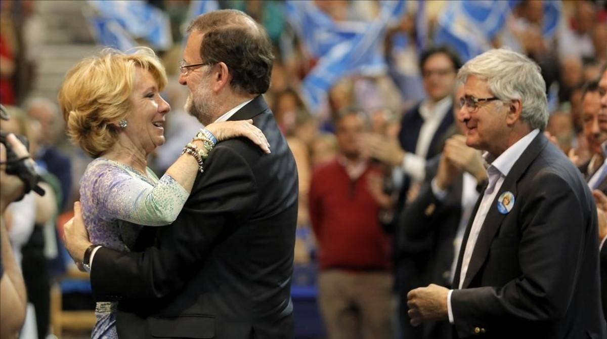 Mariano Rajoy y Esperanza Aguirre en un mitin del PP. Mariano Rajoy y Esperanza Aguirre en un mitin del PP.