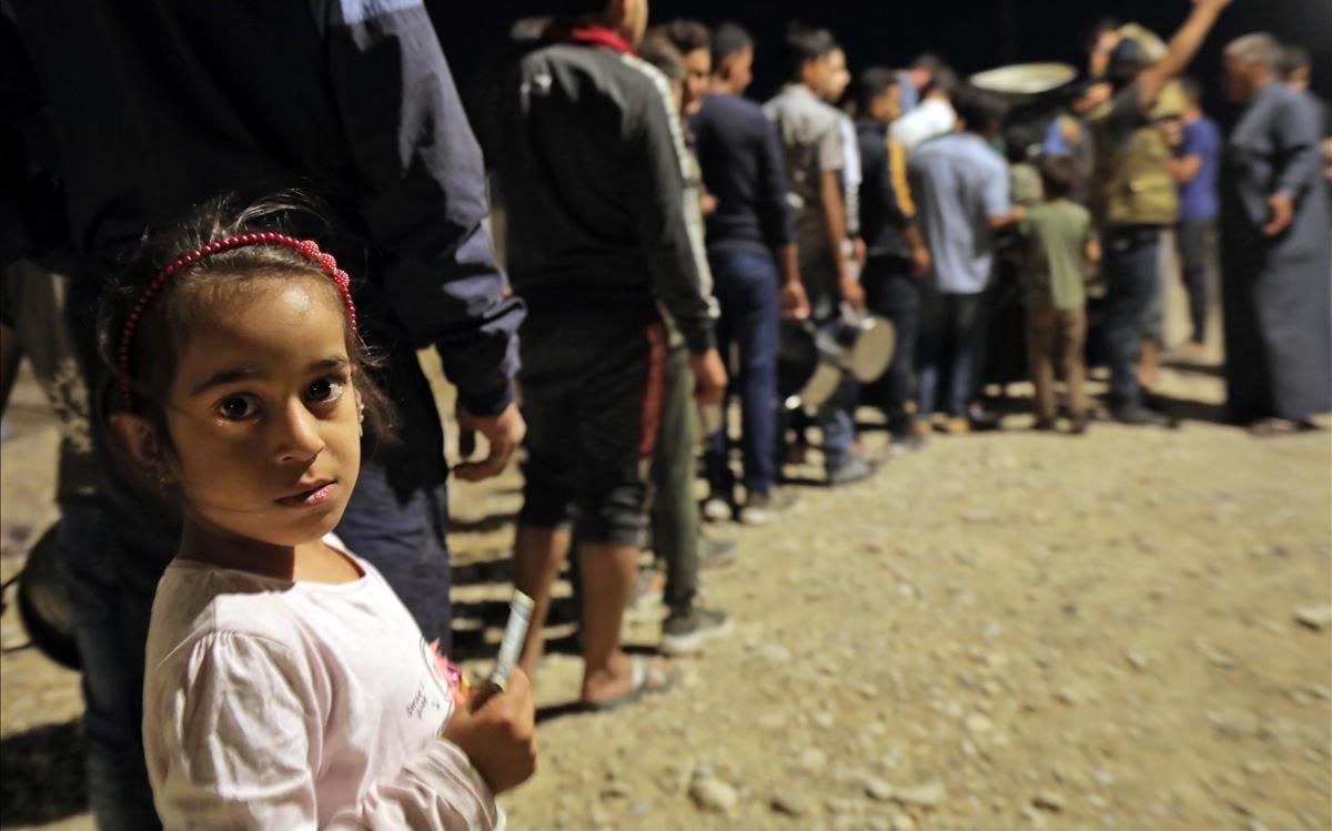 Una niña en un campamento de refugiados en Siria. Una niña en un campamento de refugiados en Siria.
