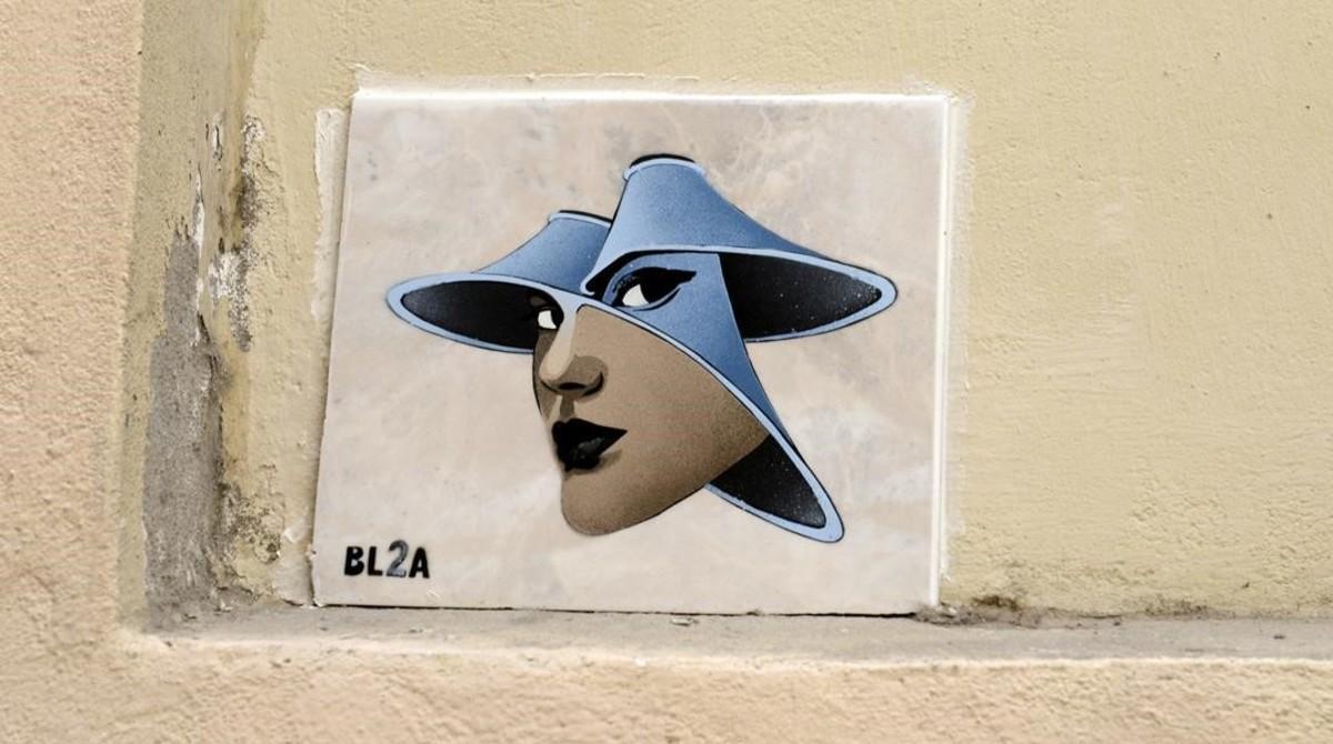 Azulejo firmado por BL2A en la calle dels Tiradors. Se pueden encontrar varios por Barcelona. 