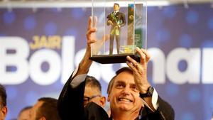 El candidato ultraderechista brasileño, Jair Bolsonaro, en un acto político en Curitiba el pasado mes de marzo.