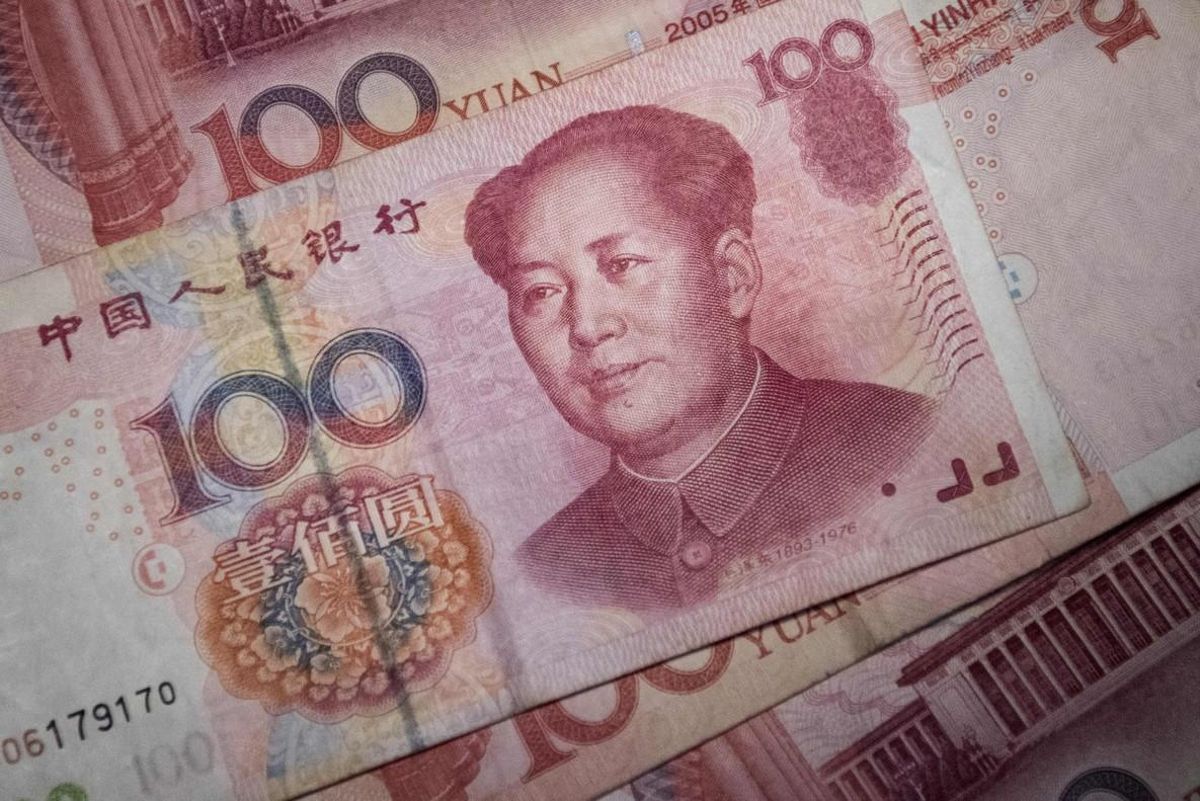 Un billete de 100 yuan. Un billete de 100 yuan.
