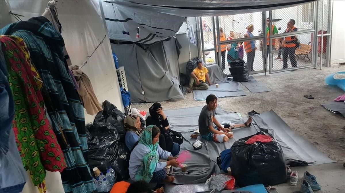 Refugiados en el asentamiento de Lesbos, en Grecia. Refugiados en el asentamiento de Lesbos, en Grecia.