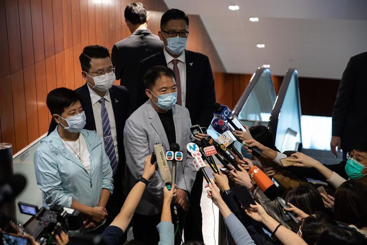 Varios opositores de Hong Kong, en una comparecencia ante los medios. Varios opositores de Hong Kong, en una comparecencia ante los medios.