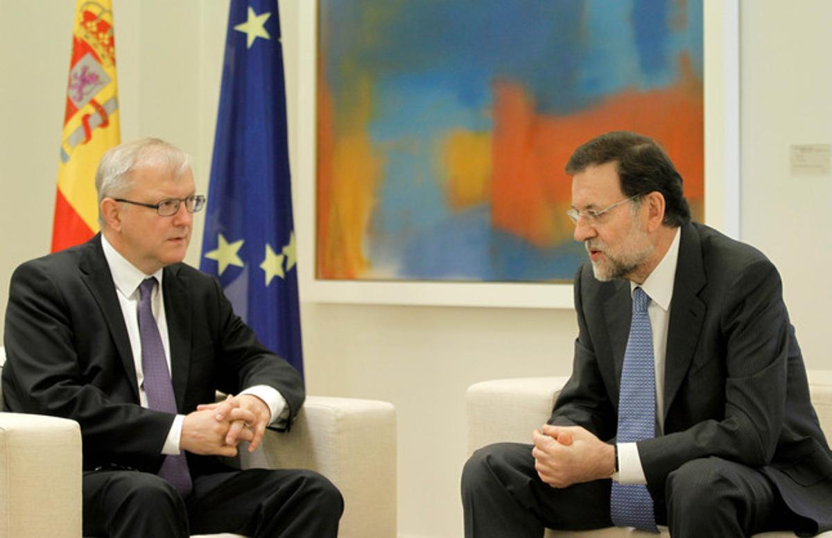 El comisario económico de la Comisión Europea, Olli Rehn, y Mariano Rajoy, el pasado octubre en la Moncloa.