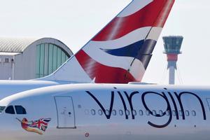 Dos aviones de compañías británicas en el aeropuerto de Heathrow airport, en Londres.