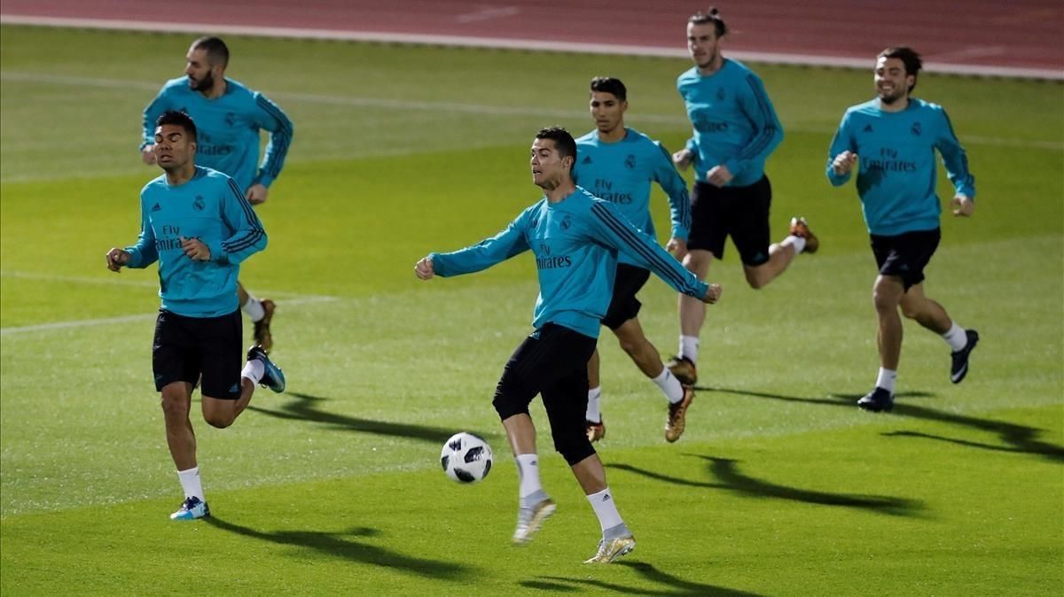 Jugadores del Madrid, durante el entrenamiento de este viernes. Jugadores del Madrid, durante el entrenamiento de este viernes.