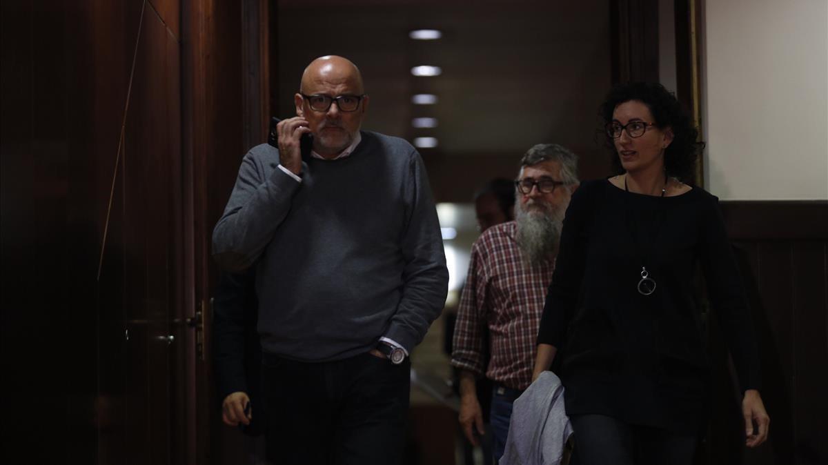 Lluís Corominas, Marta Rovira y Joan Garriga, este jueves, en el Parlament.