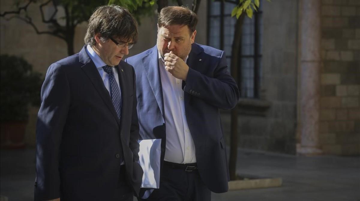 Puigdemont y Junqueras, en el Palau de la Generalitat el pasado mes de mayo.