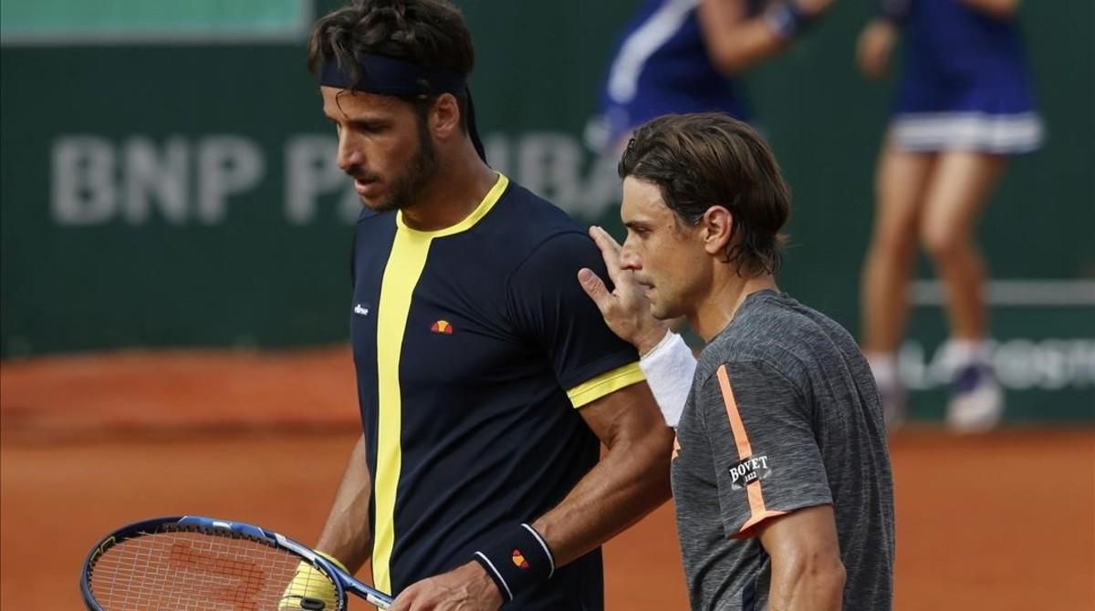 Ferrer y Feliciano, tras su partido del sábado en Roland Garros. El alicantino irá a Río, y el toledano ha renunciado por cuestión de calendario. Ferrer y Feliciano, tras su partido del sábado en Roland Garros. El alicantino irá a Río, y el toledano ha renunciado por cuestión de calendario.