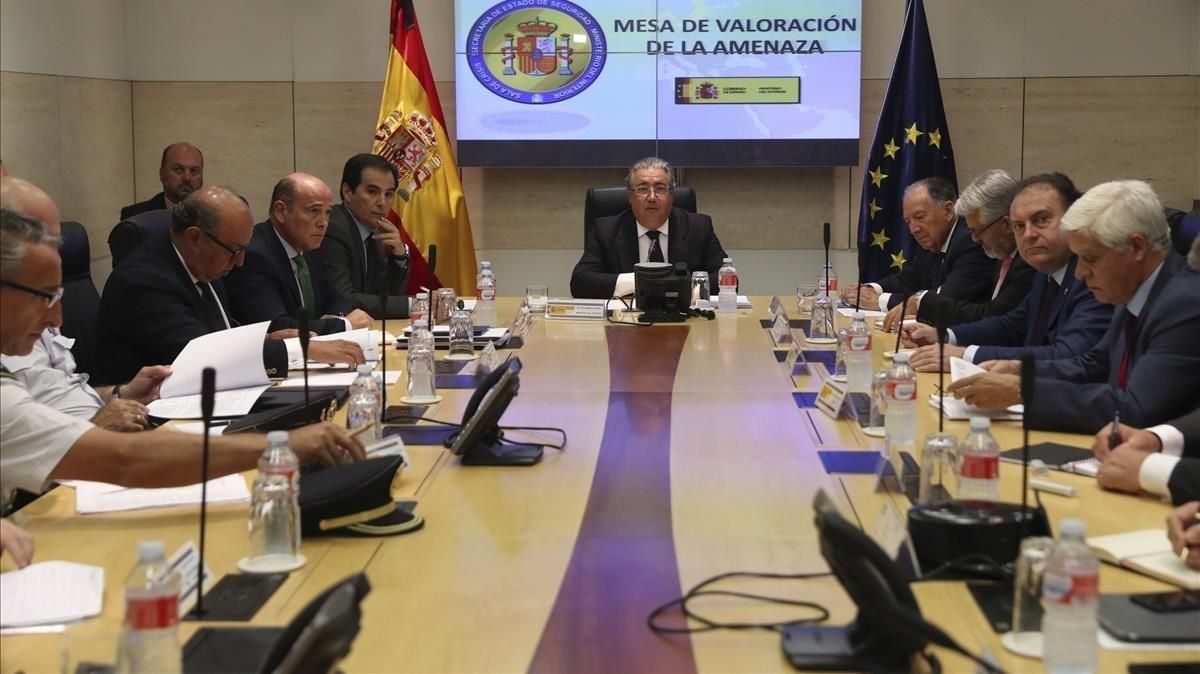 La mesa de evaluación, presidida por el ministro Juan Ignacio Zoido. La mesa de evaluación, presidida por el ministro Juan Ignacio Zoido.