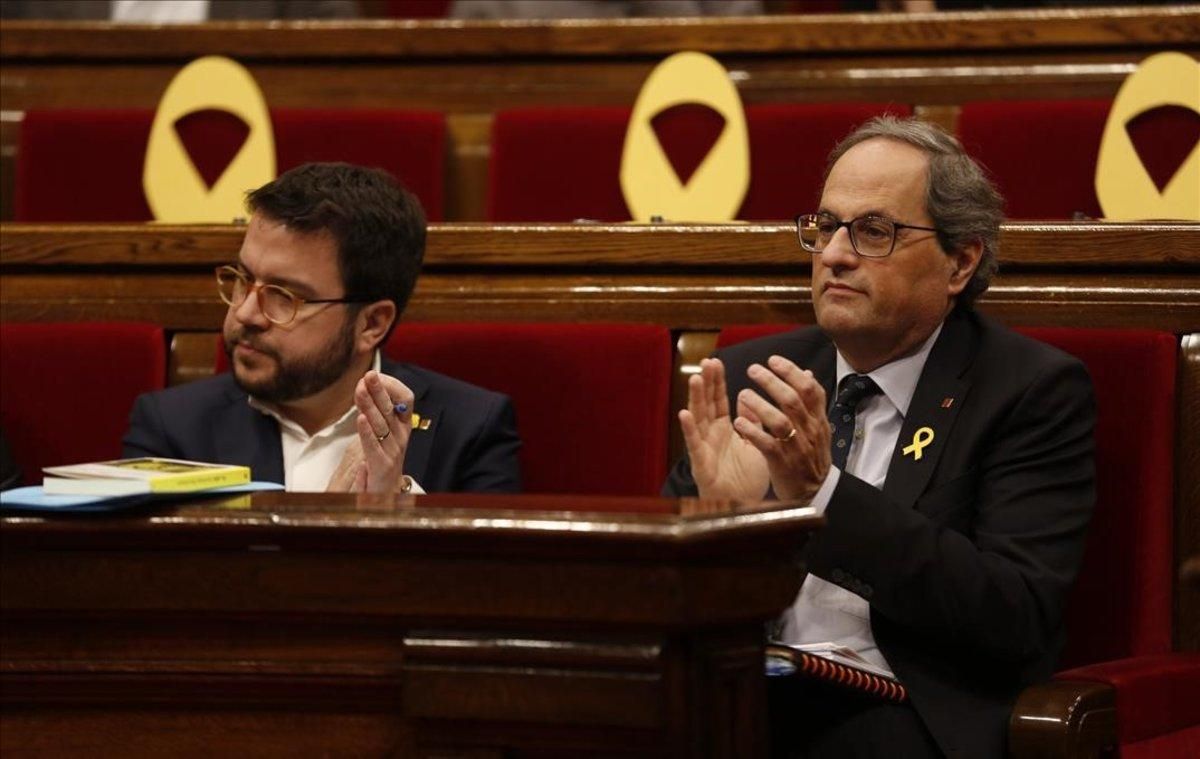 Pere Aragonès y Quim Torra, en el Parlament. Pere Aragonès y Quim Torra, en el Parlament.