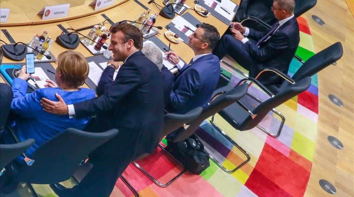 Emmanuel Marcon y Angela Merkel durante la cumbre. Emmanuel Marcon y Angela Merkel durante la cumbre.