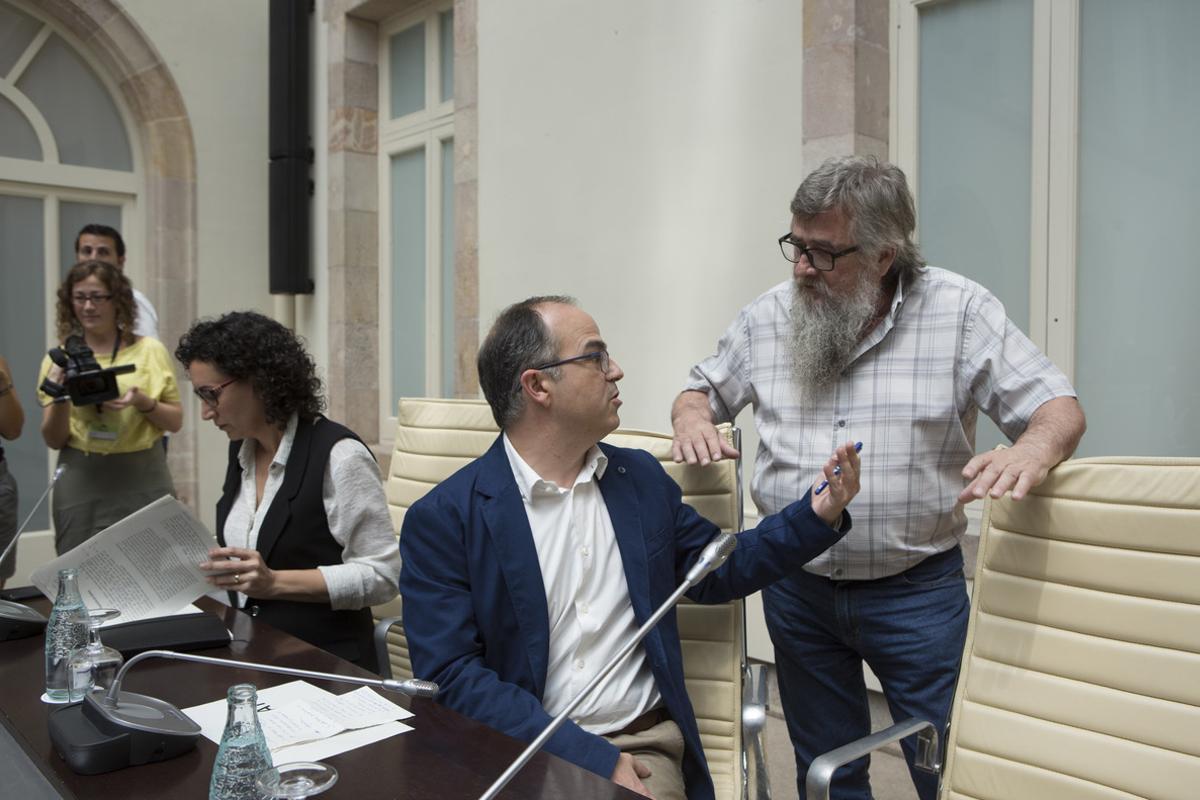 Marta Rovira (ERC), Jordi Turull (Pdecat) y Joan Garriga (CUP), el 4 de julio del 2017 en el auditorio del Parlament.