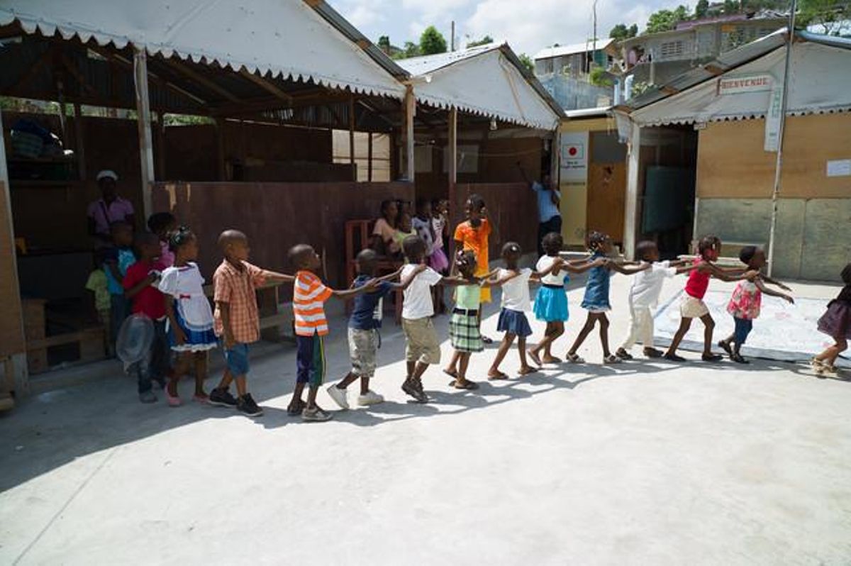 Niños participan en una escuela de verano en el barrio de Carrefour, Puerto Príncipe. Niños participan en una escuela de verano en el barrio de Carrefour, Puerto Príncipe.